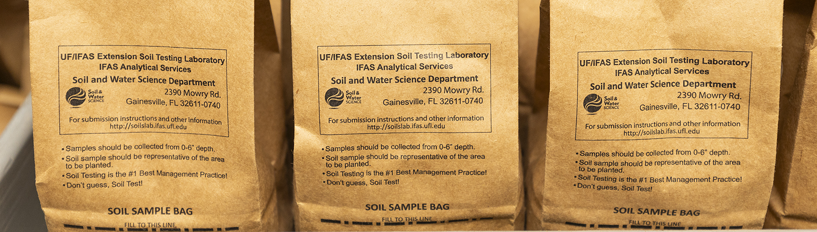 three soil sample bags close up view